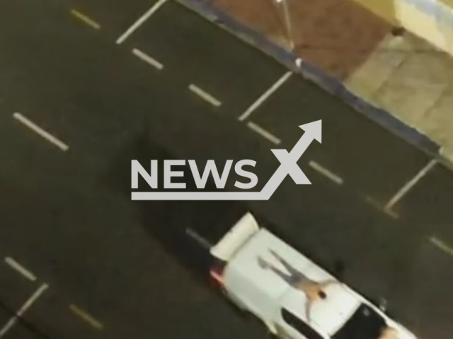 Bank robbers tie hostages to car roofs while escaping in Aracatuba in Sao Paulo in Brazil in August 2021. Note: Photo is a screenshot from a video(Newsflash)