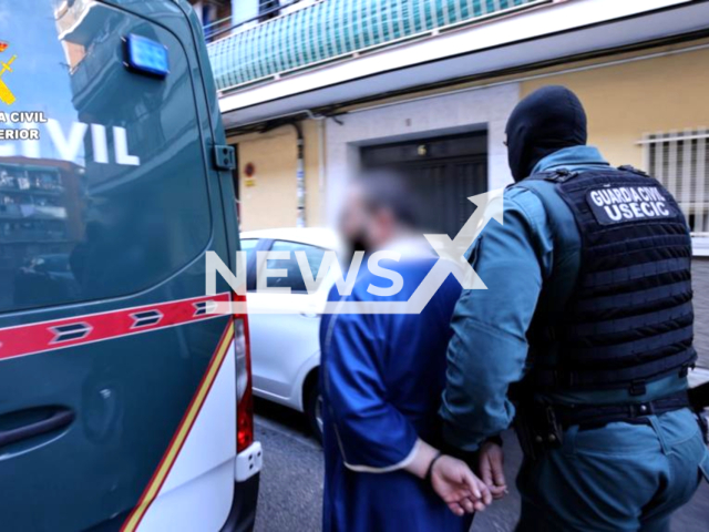 Image shows the arrest of the 44-year-old Arabic imam in Madrid, Spain, undated photo. He was apprehended for using his position to "radicalise minors" and recruit possible Islamic State (IS) members on Nov. 29, 2023. Note: Police photo. (Guardia Civil/Clipzilla)