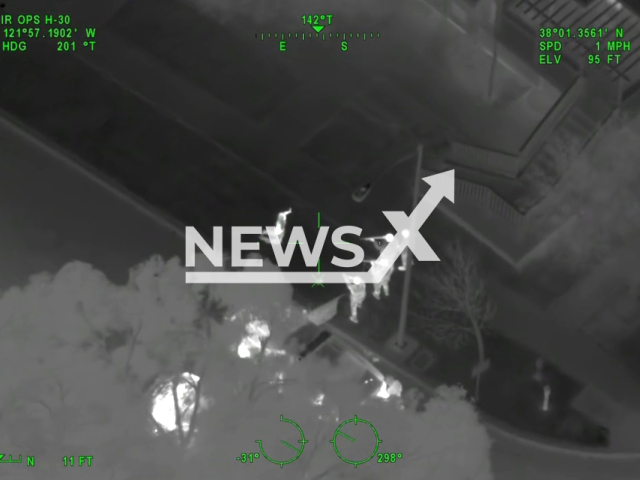 Image shows officers holding an individual at gunpoint, undated photo. Five people were placed in custody after a multi-county pursuit in California State, USA, on Saturday, Dec. 9, 2023. Note: Photo is a screenshot from a video. (CHP - Golden Gate Division Air Operations/Clipzilla)