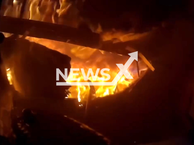 Image shows a firefighter's viewpoint during the fire, undated photo. The incident happened in Kern County, California State, USA, on Dec. 8, 2023. Note: Photo is a screenshot from a video. (California City Fire Department/Clipzilla)