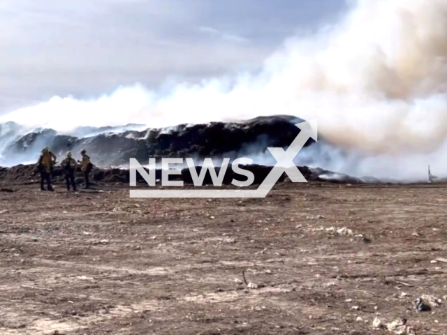 The image shows fires at Orange County, California State, USA, undated photo. Firefighters were holding the fire to the compost piles in the landfill as additional crews continued patrolling in the down-wind neighborhoods on Dec. 9, 2023. Note: Photo is a screenshot from a video. (OCFA PIO/Clipzilla)