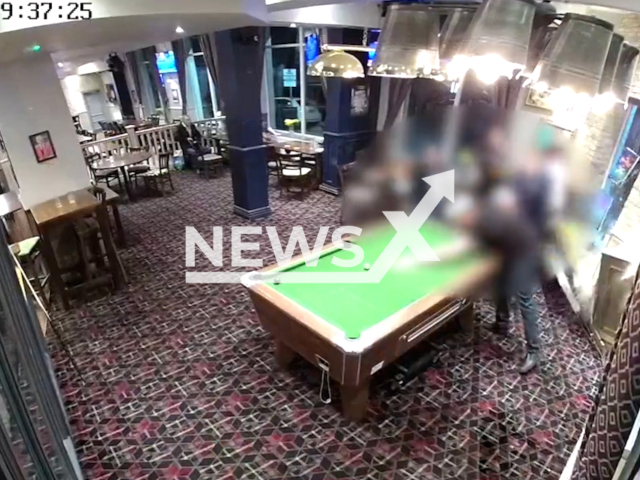 A driver trying to escape pursuing police smashed into people playing pool at The Lockside pub in Worksop, UK,  March 27  2023. 
Note: Picture is screenshot from a video. (@nottspolice/Clipzilla)