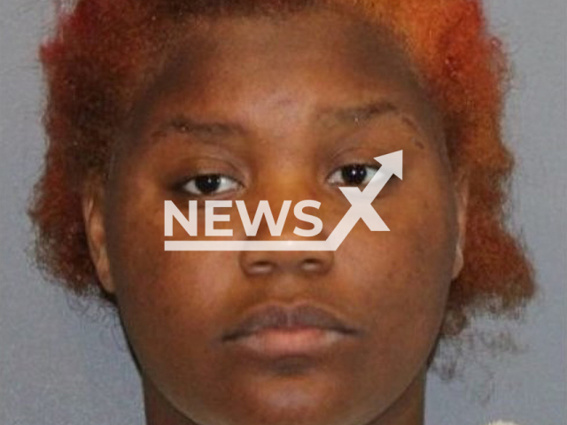 Tranisa Octavin Trana Watts (23) suspected of having shot her child's grandmother, Kentoria Edwards (52) at a Texas Starbucks.
Note: Police photo(Richardson Police Department/Newsflash).