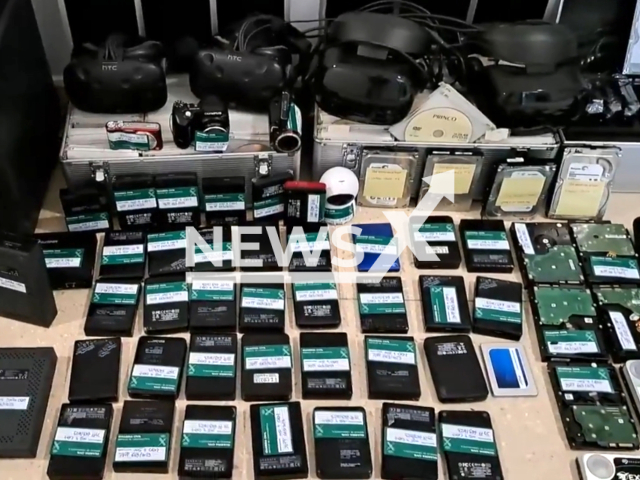 Police arrest a pedophile with 60 hard drives full of child pornographic material, in Cadiz, Spain. Note: Picture is a screenshot from the video. (Clipzilla)