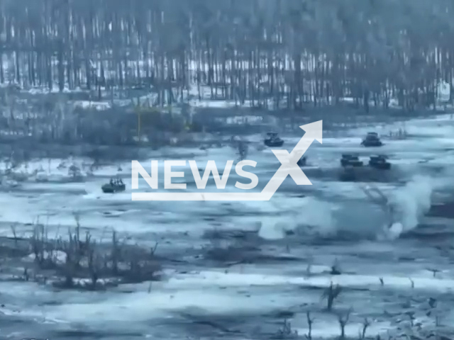 Ukrainian Forces destroy Russian armoured vehicle on Luhansk frontlines in Ukraine in undated footage. The footage was released by the 14th separate mechanized brigade on Sunday, Dec. 17, 2023.Note: Picture is screenshot from a video. (@14ombr/Newsflash)