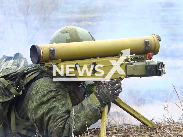 Russian soldiers fire with Metis-M1 portable anti-tank missile system at Ukrainian military positions near Vuhledar in Ukraine in undated footage. The footage was released by the Russian MoD on Thursday, Dec. 21, 2023.  Note: Picture is screenshot from a video. (Russian Ministry of Defence/Newsflash)