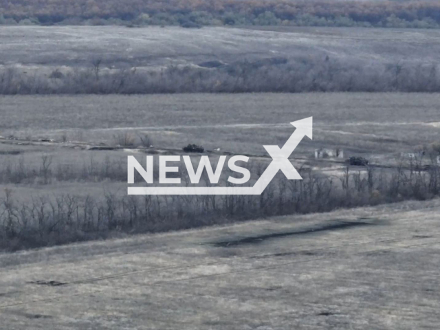 Ukrainian forces destroy two Russian armoured personnel carriers moving on the road in Ukraine in undated footage. The footage was released by the National Guard of Ukraine on Thursday, Dec. 21, 2023. Note: Picture is screenshoot from a video (@ngu_war_for_peace/Newsflash)