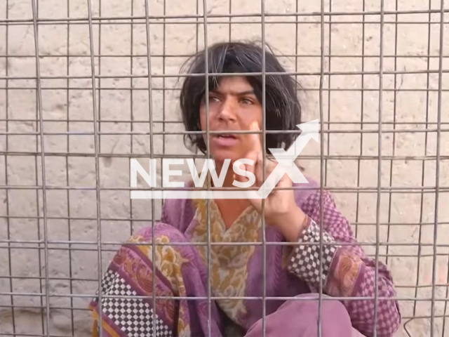 Girl being held in a cage due to a neurological disease by her family in Kandahar, Afghanistan. Note: Photo is a screenshot from a video(Newsflash).