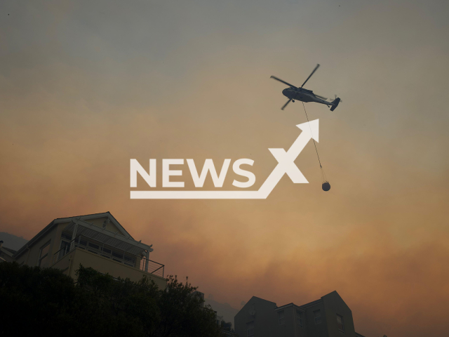 Picture shows a firefighter battling the wildfire in Simon's Town, South Africa, in December, 2023. Residents were evacuated and 300 firefighters were involved.
Note: Private photo with permission to use. (Gunnar Oberhosel, @theglobetrotterguy/Newsflash)