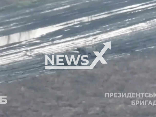 Ukrainian kamikaze drones hit Russian military equipment on the frontlines in Ukraine in undated footage. The footage was released by the Separate Presidential Brigade on Sunday, Dec. 24, 2023. Note: Picture is screenshot from a video. (@opbr_zsu/Newsflash)