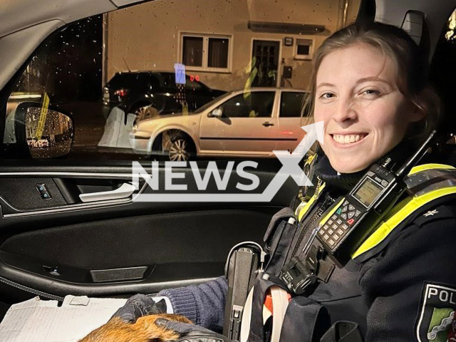 Photo shows policewoman Paula holding the guinea pig on the way to the station, undated. The animal was rescued by the police in Herne-Holsterhausen on Thursday, December 21, 2023.
Note: Licensed photo(Bochum Police/Newsflash).