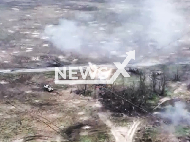 Ukrainian forces destroy Russian personnel armoured carriers and soldiers using drones on the frontlines in Ukraine in undated footage. The footage was released by the 36th Separate Marine Infantry Brigade on Wednesday, Dec. 27, 2023.Note: Picture is screenshot from a video. (@36obmp/Newsflash)