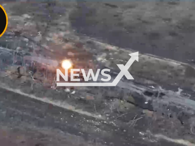 Ukrainian drone hits Russian fighters who were moving on an armoured vehicle on the frontlines in Ukraine in undated footage. The footage was released by the Adam Joint Task Force on Friday, Dec. 29, 2023. Note: Picture is screenshot from a video. (@adamtactic/Newsflash)