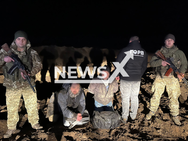 Border police arrest two Ukrainian citizens trying to cross the border to Moldova near Odesa in Ukraine in undated footage. The footage was released by the Izmail Border Detachment on Wednesday, Jan. 3, 2024. Note: Police photo. (@Izmpz/Newsflash)