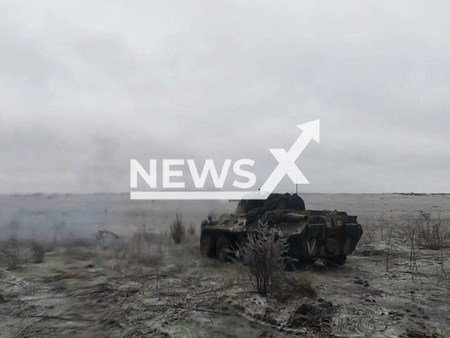 Russian armored personnel carriers fire at Ukrainian firing points near Bakhmut in Ukraine in undated footage. The footage was released by the Russian MoD on Thursday, Jan. 4, 2024.
Note: Picture is screenshot from a video. (Russian Ministry of Defence/Newsflash)