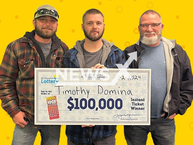 Timothy Domina (middle) of Eden, NC, poses in undated photo. A $20 scratch-off delivered him a $100,000 prize. Note: Lottery photo. (NC Education Lottery/Newsflash)