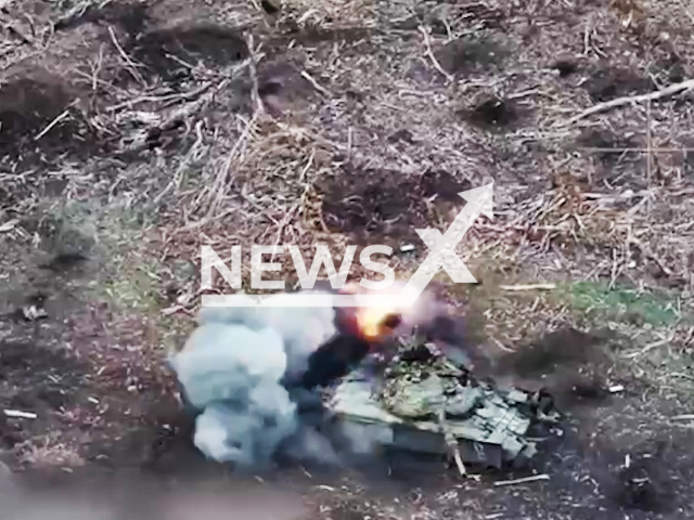 Ukrainian kamikaze drone hits Russian tank on the battlefield in Ukraine in undated footage. The footage was released by the Operational Command "West" on Friday, Jan. 5, 2024.
Note: Picture is screenshot from a video. (@operationalcommandwest/Newsflash)