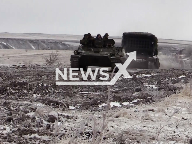 Russian TOS-1A “Solntsepyok” fires a salvo of 220-mm thermobaric rockets at Ukrainian military positions in Lyman's region in Ukraine in undated footage. The footage was released by the Russian MoD on Monday, Jan. 8, 2024.Note: Picture is screenshot from a video. (Russian Ministry of Defence/Newsflash)