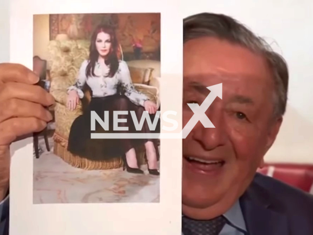 Photo shows Richard Lugner holding a photo of Priscilla Presley, undated. He announced that she is this year's star guest at the Vienna Opera Ball. Note: Photo is a screenshot from a video(Newsflash).