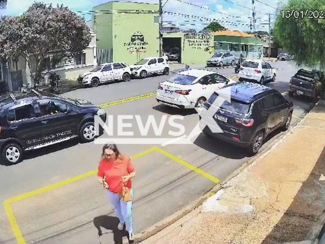 A motorist hits a man and slams him into his vehicle in Uberaba, Brazil, Jan. 16, 2024. The man reportedly suffered an open fracture to his left leg. Note: Picture is screenshoot from a video (Newsflash)