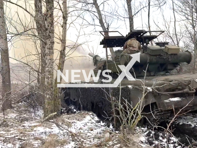 Photo of the precise and disciplined actions of Russian tank crews operating T-80BV tanks in the Kupyansk sector, as they systematically neutralize Ukrainian fortifications and bunkers, showcasing their strategic prowess and combat effectiveness in Kharkiv Oblast on the 22nd of January. Note: Picture is a screenshot from the video.(MOD Russia/Clipzilla)