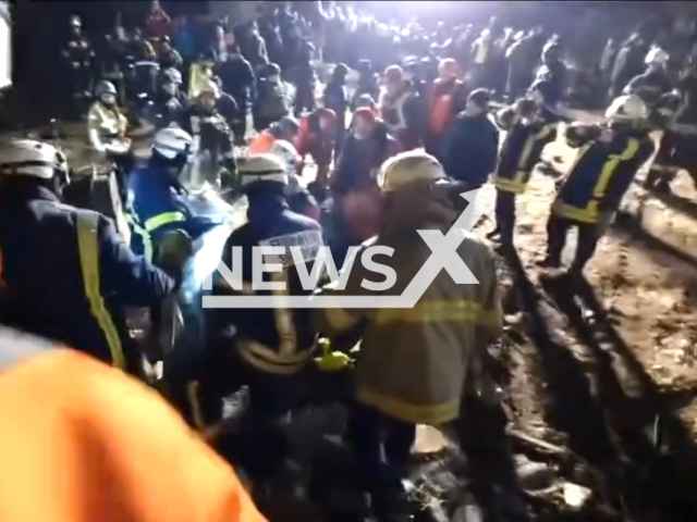 The rescuers unblocked the girl's body from under the rubble in Kharkiv, Ukraine in 23 January 2024.Note: Picture is a screenshot from the video. (Ministry of Internal Affairs of Ukraine/Clipzilla)