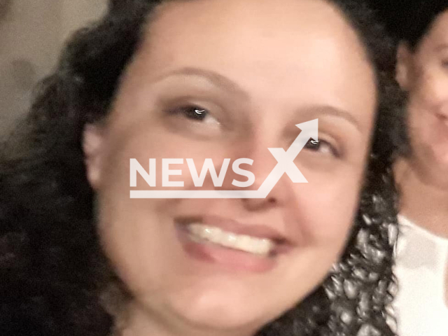 Luciana Morgado Cerri Teixeira, 42, poses in undated photo. She died during sliding down a toboggan with her son, 7, at the Ski Mountain Park in Sao Roque, Brazil. Note: Private photo. (Luciana Cerri/Newsflash)