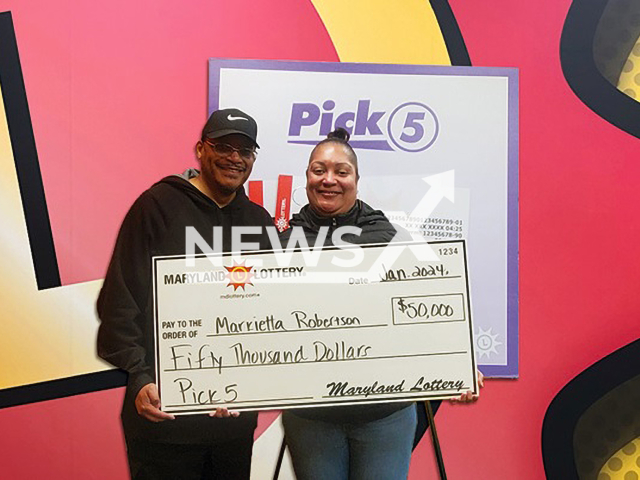 Upper Marlboro resident Markietta Robertson and her husband James celebrate her $50,000 Pick 5 win using her license plate numbers in Maryland, US, undated. Note: Lottery photo. (Maryland Lottery/Newsflash)