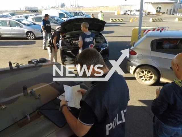 Police seize 200 vehicles of illicit origin using foreign documentation, including stolen or counterfeit documents, in Italy. Note: This picture is a screenshot from the video. (Polizia di stato/Clipzilla)