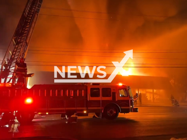 Firemen put out multiple businesses on fire, in Montgomery, Alabama, USA, on Sunday, Jan. 28, 2024. Note: Picture is a screenshot from the video. (Montgomery Fire/Rescue/Clipzilla)