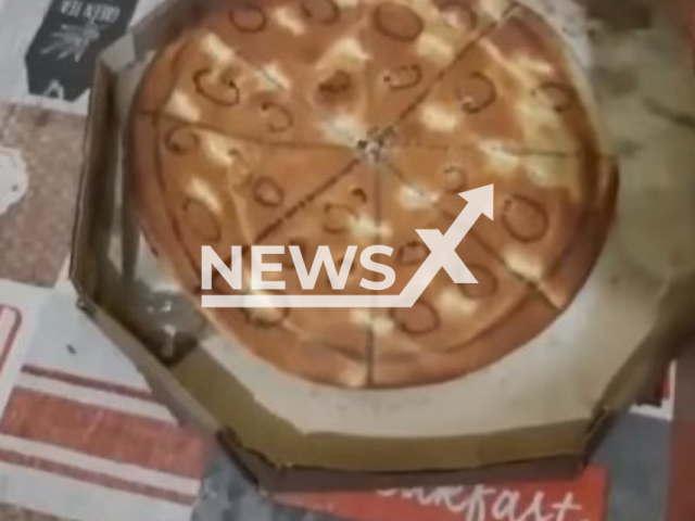 Photo shows a cardboard pizza, undated. Pizzeria delivered it to a customer who provided a fake Pix receipt in Colinas do Tocantins, Brazil in January 2024.
Note: Photo is a screenshot from a video(Newsflash)