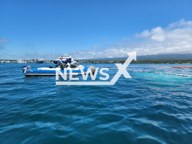 The containment and clean up measures implemented after the sinking of a tourist vessel on Santa Cruz Island, Galapagos National Park, to reduce the impacts on marine ecosystems, in April, 2022. 
Note: Photo  from press statment . (Galapagos Parque/Newsflash)