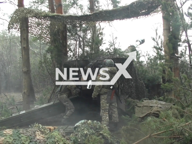 Russian soldiers use howitzer to destroy the command observation post of Ukrainian troops in the Serebryansky area, Ukraine. Note: Picture is a screenshot from the video. (Ministry of Defense of the Russian Federation/Clipzilla)