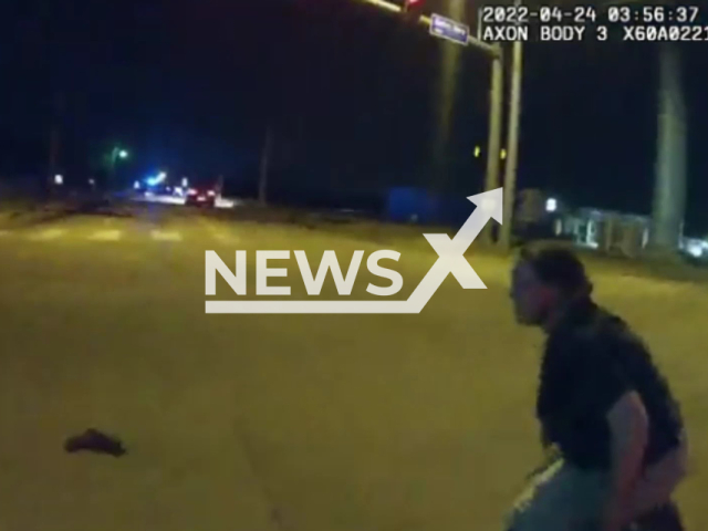 Police officer hurt after being dragged by a car in Fort Smith, Arkansas, USA. Note: Photo is a screenshot from the video (@FortSmithPD/Newsflash)