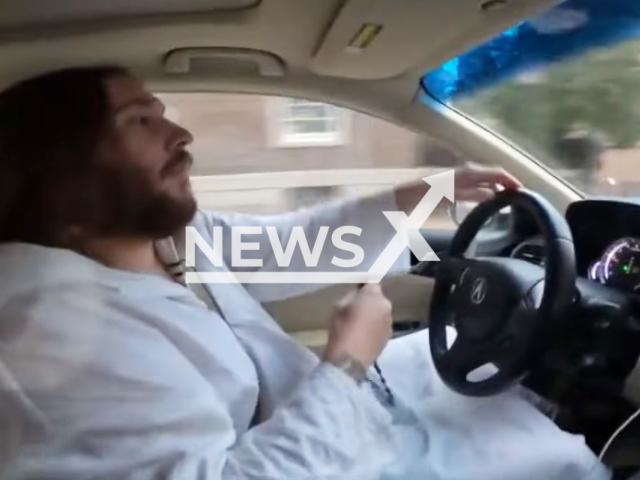 Photo shows Michael Grant known as 'Philly Jesus', undated. After nearly a decade, the Philadelphia Lyft driver is returning to the streets. Note: Photo is a screenshot from a video(Newsflash).