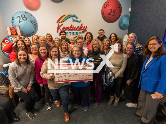 Photo shows group of Kentucky Middle School Employees, undated. They won $1 million and hide the tcket in Math textbook.
Note: Licensed photo(Kentucky Lottery/Newsflash).