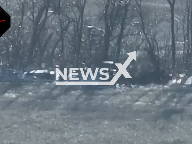 Ukrainian kamikaze drone destroys Russian excavator on frontlines in Ukraine in undated footage. The footage was released by the 72nd Brigade's strike drones company on Friday, Feb. 2, 2024.  Note: Picture is screenshot from a video. (@BULAVA72b/Newsflash)