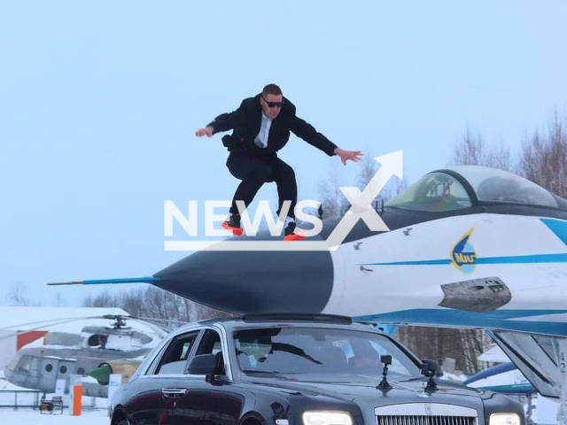 Photo shows stuntman Evgeny Chebotarev from Rostov-na-donu, Russia, undated. Blogger performed another stunt where he is on the roof of a Rolls-Royce car jumping over a passing aeroplane. Note: We have obtained permission for this photo (@chebotarev_evgeny/Newsflash)