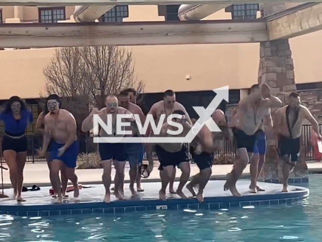 Santa Fe Police Department's "Copsicles" take the Polar Plunge to support Special Olympics athletes. Note: Picture is a screenshot from the video. (Santa Fe Police Department/Clipzilla)