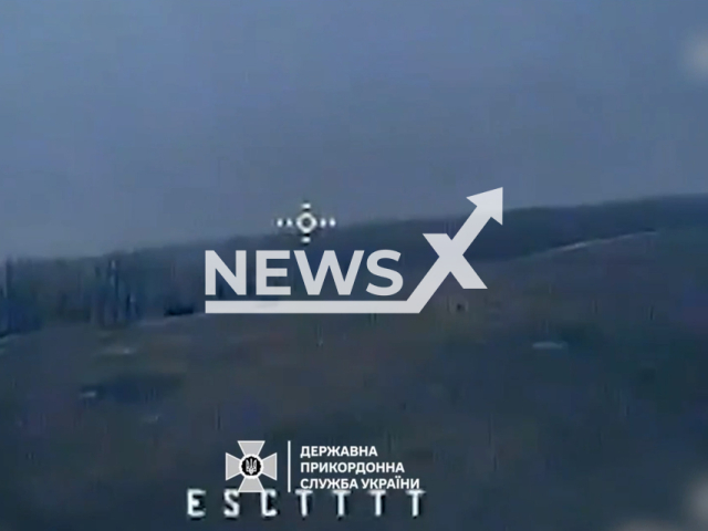 Ukrainian kamikaze drones destroy Russian war machines in the Donetsk region in Ukraine in undated footage. The footage was released by the State Border Guard Service of Ukraine on Tuesday, Feb. 6, 2024.  Note: Picture is screenshot from a video. (@DPSUkr/Newsflash)