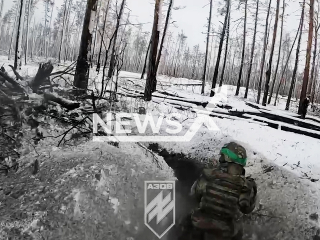 Azov Brigade fighters clear Russian positions in the Serebryanske forestry in the Luhansk region in Ukraine in undated footage. The footage was released by the 72nd Brigade's Company of Strike Unmanned Aerial Vehicles on Wednesday, Feb. 7, 2024. Note: Picture is screenshot from a video. (@ngu_war_for_peace/Newsflash)