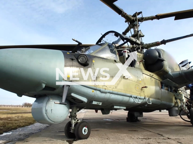 The crews of Ka-52M helicopters launch missiles at Ukrainian strongholds in the Lugansk direction Ukraine. Note: Picture is a screenshot from the video. (Ministry of Defense of the Russian Federation/Clipzilla)