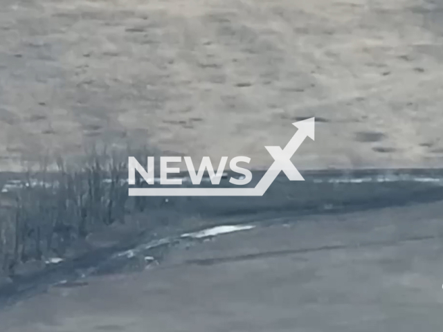 Ukrainian forces destroy a Russian military truck in a powerful blast in Ukraine in undated footage. The footage was released by the 63rd Separate Mechanised Brigade of the Armed Forces of Ukraine on Thursday, Feb. 8, 2024. Note: Picture is screenshot from a video. (@ombr_63/Newsflash)