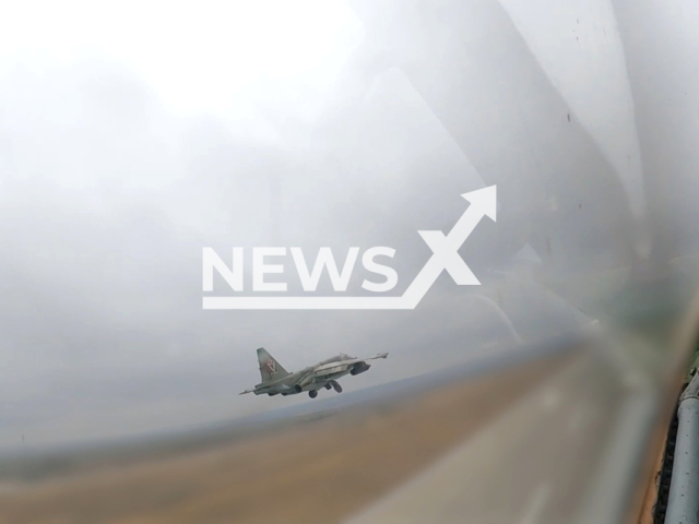 The crews of Su-25 attack aircraft of the Russian Aerospace Forces destroyed enemy strongholds and manpower in the city of Lyman, in Ukraine's Donetsk oblast. Note: Picture is a screenshot from the video. (Ministry of Defense of the Russian Federation/Clipzilla)