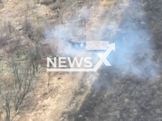 Ukrainian drones drop bombs on the Russian soldiers in the trenches in Ukraine in undated footage. The footage was released by the 128th separate Transcarpathian Mountain Assault Brigade. on Thursday, Feb. 8, 2024.  Note: Picture is screenshot from a video. (@brigade128/Newsflash)