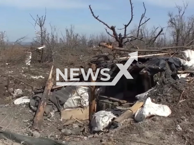 Fortified area of ​​the Armed Forces of Ukraine taken by storm in April 2022, with weapons left there and the bodies of the dead Ukrainian military. Note: Photo is a screenshot from a video(Ministry of Defense of Russia/Newsflash).