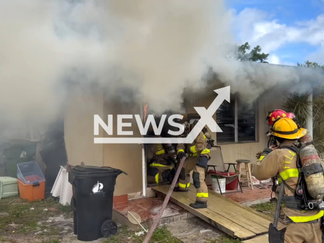 Crews put out a fire at a single family residence, in Fort Lauderdale, Florida, USA, on Thursday, Feb. 8, 2024. Note: Picture is a screenshot from the video. (Fort Lauderdale Fire Rescue/Clipzilla)