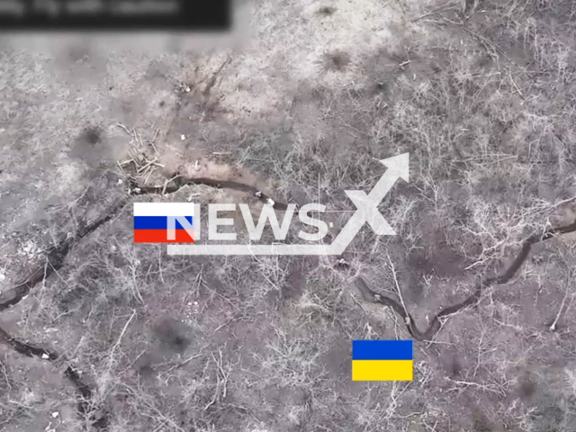 Russian troops shoot surrendering Ukrainian soldiers in the trench in Ukraine in undated footage. The footage was released by the Ground forces of the Armed Forces of Ukraine on Sunday, Feb. 18, 2024. Note: Picture is screenshoot from a video (@landforcesofukraine/Newsflash)