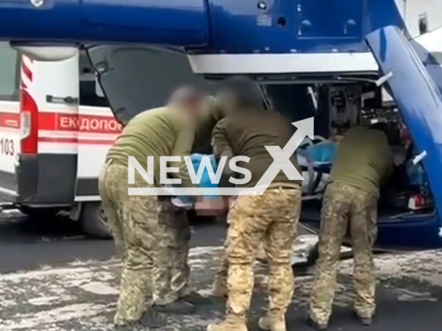 Pilots of the Aviation Support Center of the National Police continue to carry out aeromedical evacuation of the wounded from hospitals on police helicopters in Ukraine. Note: Picture is a screenshot from the video. (Ministry of Internal Affairs of Ukraine/Clipzilla)