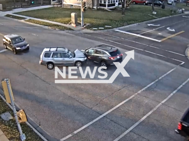 A crash is caused by a driver that failed to indicate, in Overland Park, Kansas, USA. Note: Picture is a screenshot from the video. (Overland Park Police Department/Clipzilla)